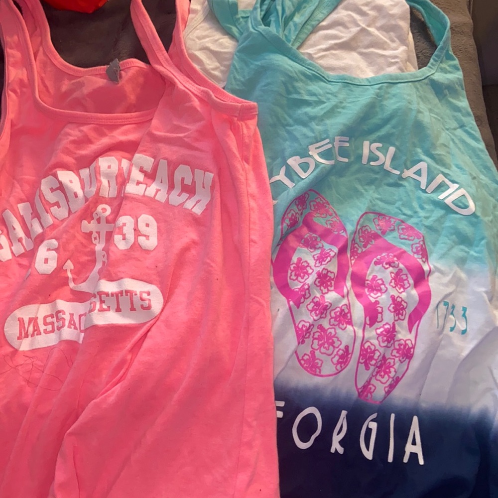 Plain white tank top and two beach tank tops